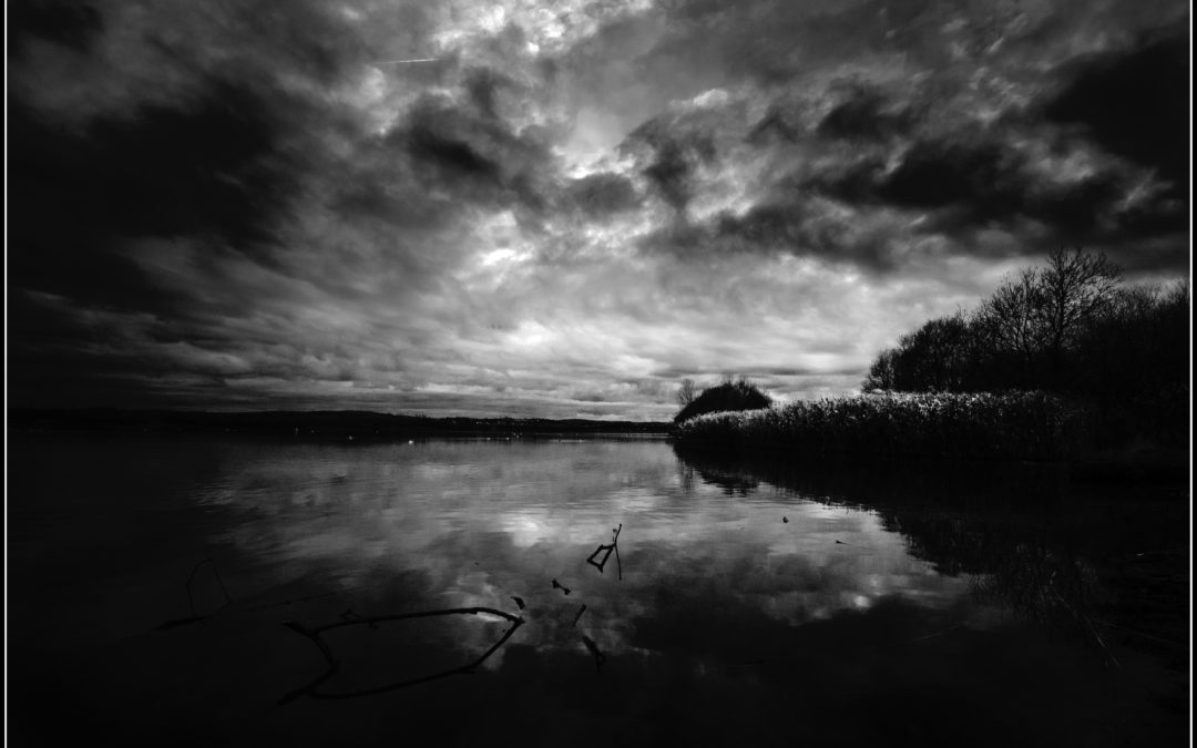 Photo by Stephen Bowlder via Flickr, a dark bay in black and white