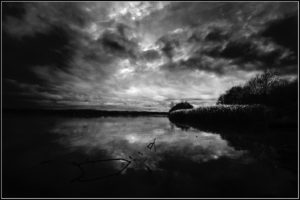 Photo by Stephen Bowlder via Flickr, a dark bay in black and white